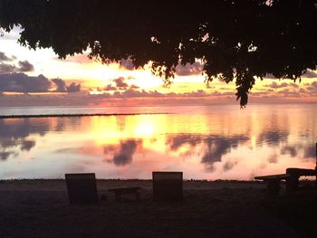 Scenic view of sunset over lake