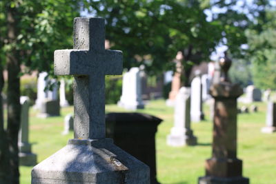 Stone cross on cemetery