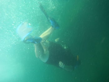 Man swimming in sea