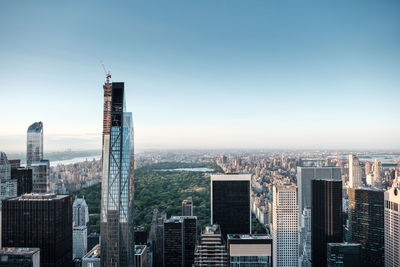 High angle view of buildings in city against sky