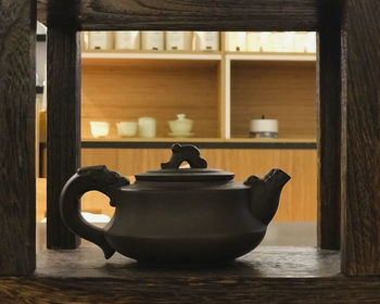 Close-up of teapot on table