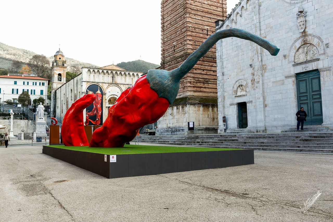 RED UMBRELLA AND CITYSCAPE