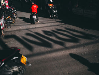 Bicycle parked on road in city