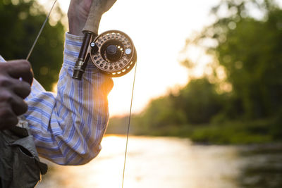 Flyfishing at sunset on a southeastern river