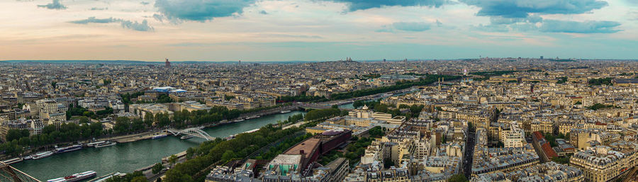 High angle view of river amidst buildings in city