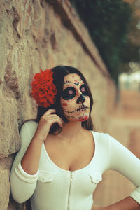 Portrait of young woman wearing mask