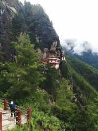 View of temple on mountain against sky