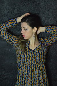 Beautiful young woman looking away