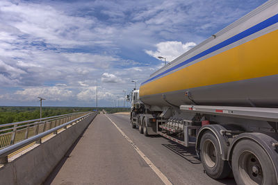 Fuel tanker on road against sky