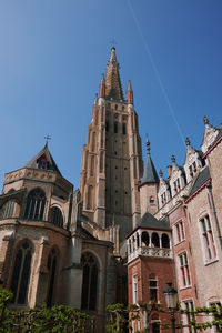 Low angle view of cathedral against clear blue sky