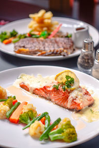 Close-up of food served on table