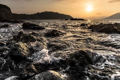 Scenic view of sea against sky during sunset