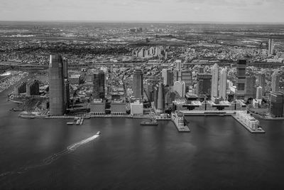 Aerial view of cityscape by river