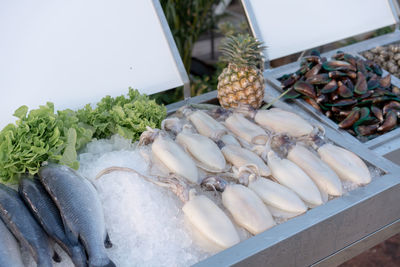 High angle view of onions for sale at market stall