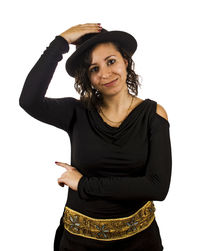 Portrait of young woman against white background