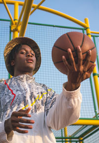 Portrait of the black man with the basketball