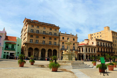 View of historic building in city against sky