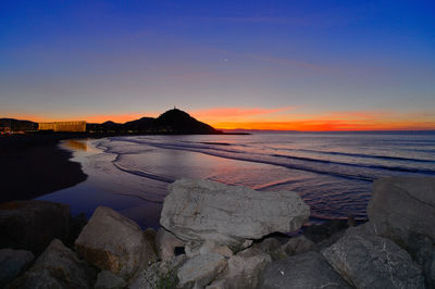 Scenic view of beach during sunset