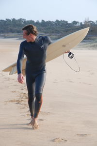 Rear view of man on beach