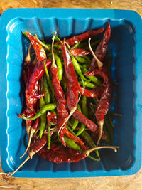 High angle view of chili peppers on table