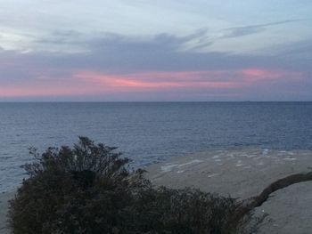 Scenic view of sea at sunset