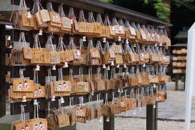 Close-up of text hanging on clothesline