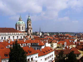 High angle view of buildings in city against sky