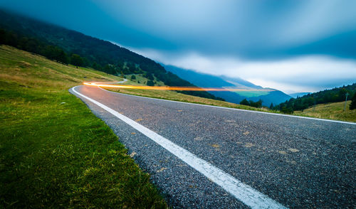 Scenic view of mountain road against sky