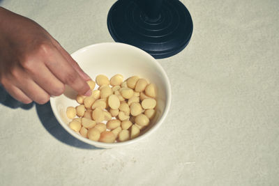 High angle view of person preparing food on table