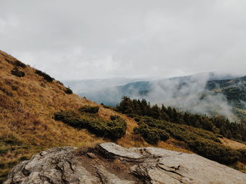 Scenic view of rocky mountains against sky