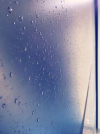 Close-up of water drops on glass