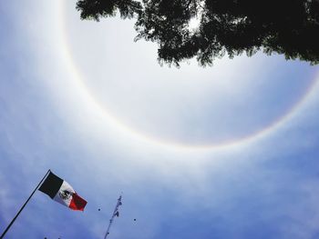 Low angle view of flag against sky