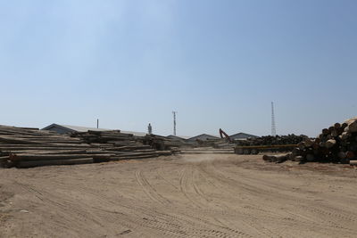 Panoramic shot of construction site against clear sky