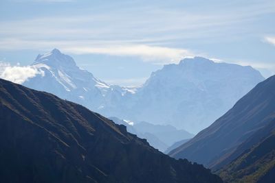 Scenic view of snowcapped mountains against sky