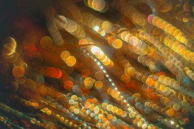 Defocused image of illuminated lights at night