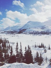 Scenic view of snow covered mountains