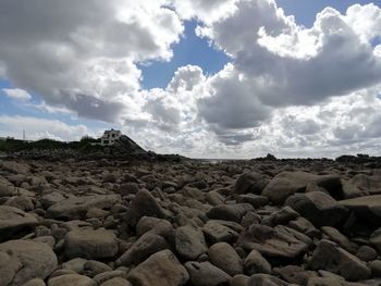 Rocks on land against sky