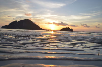 Scenic view of sea at sunset