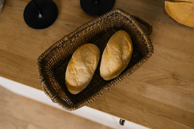 Bread in the basket. a loaf in the kitchen, homemade cakes. delicious flour products