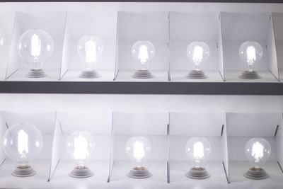 Close-up of illuminated lights on table