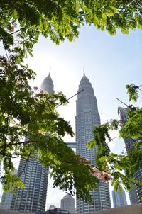 Low angle view of skyscrapers against sky