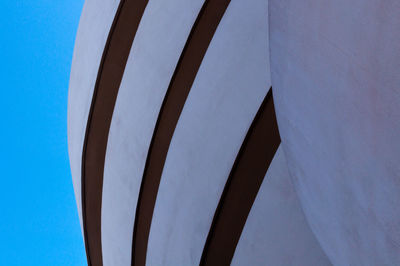 Low angle view of building against clear blue sky