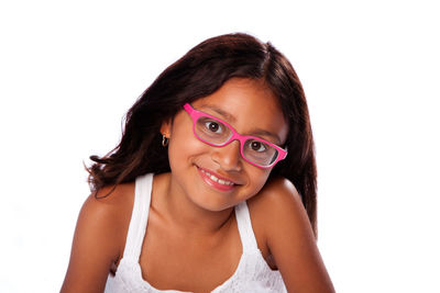 Portrait of a smiling young woman over white background