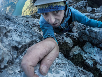 High angle view of man standing on rock