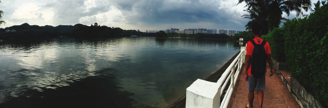 water, sky, cloud - sky, built structure, architecture, river, building exterior, cloudy, lake, reflection, cloud, transportation, nautical vessel, tree, nature, panoramic, waterfront, tranquility, boat, day