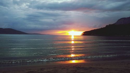 Scenic view of sunset over sea