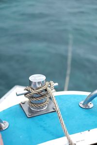 High angle view of rope tied on boat