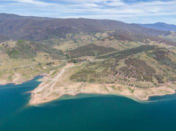 Aerial view of landscape and mountains against sky