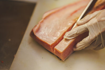 Close-up of fillet tuna on cutting board