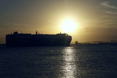 Scenic view of sea at sunset